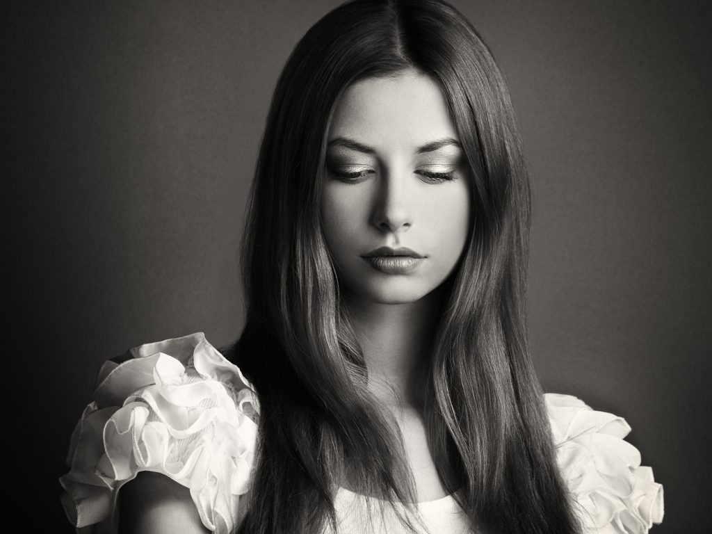 Fashion photo of a young woman with dark hair